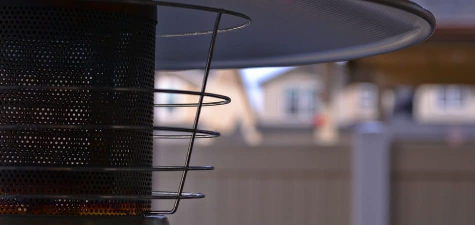 Outdoor patio heater warming a residential backyard patio