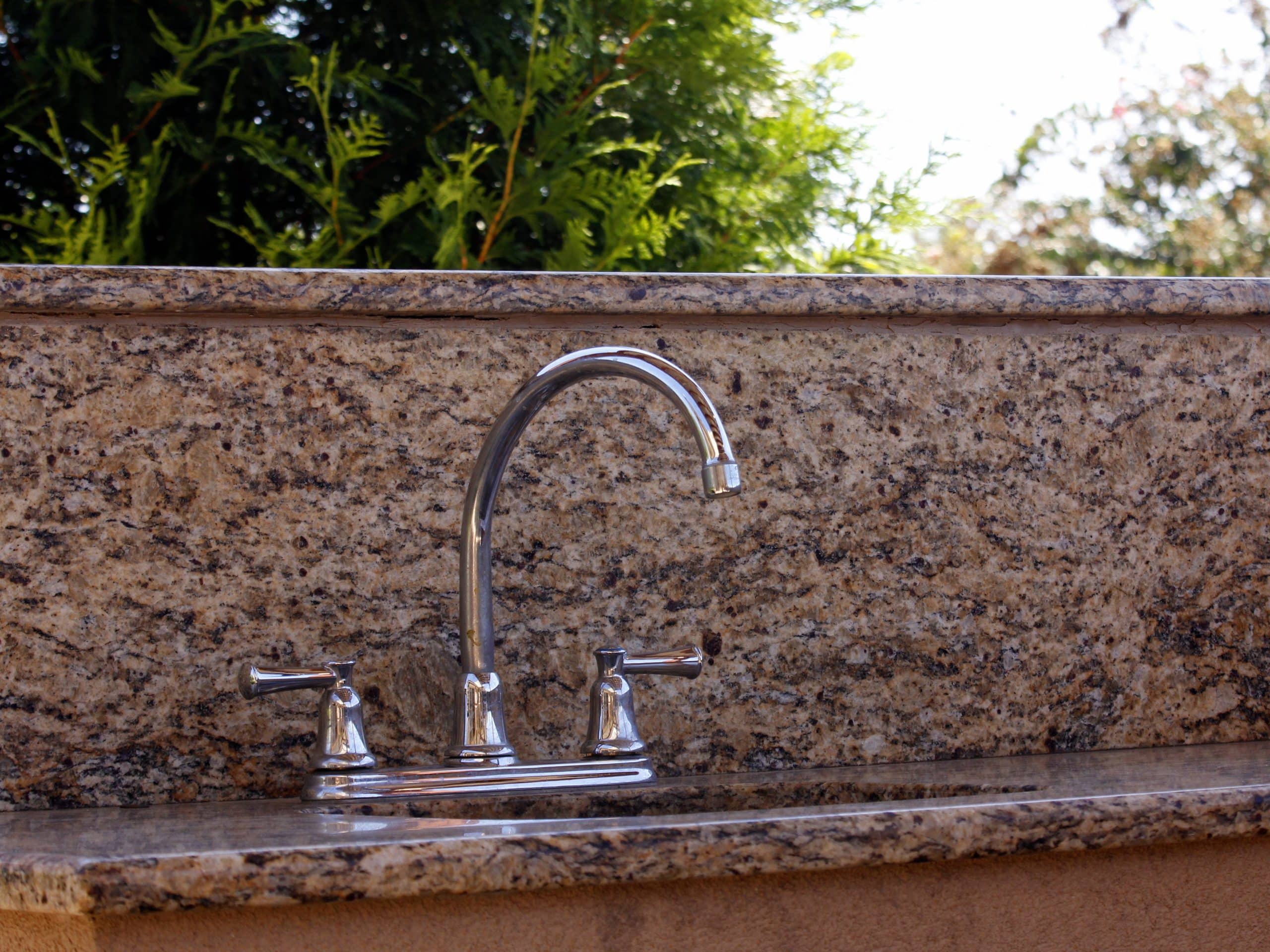 Plumbing rough-in for an outdoor kitchen sink and counter run